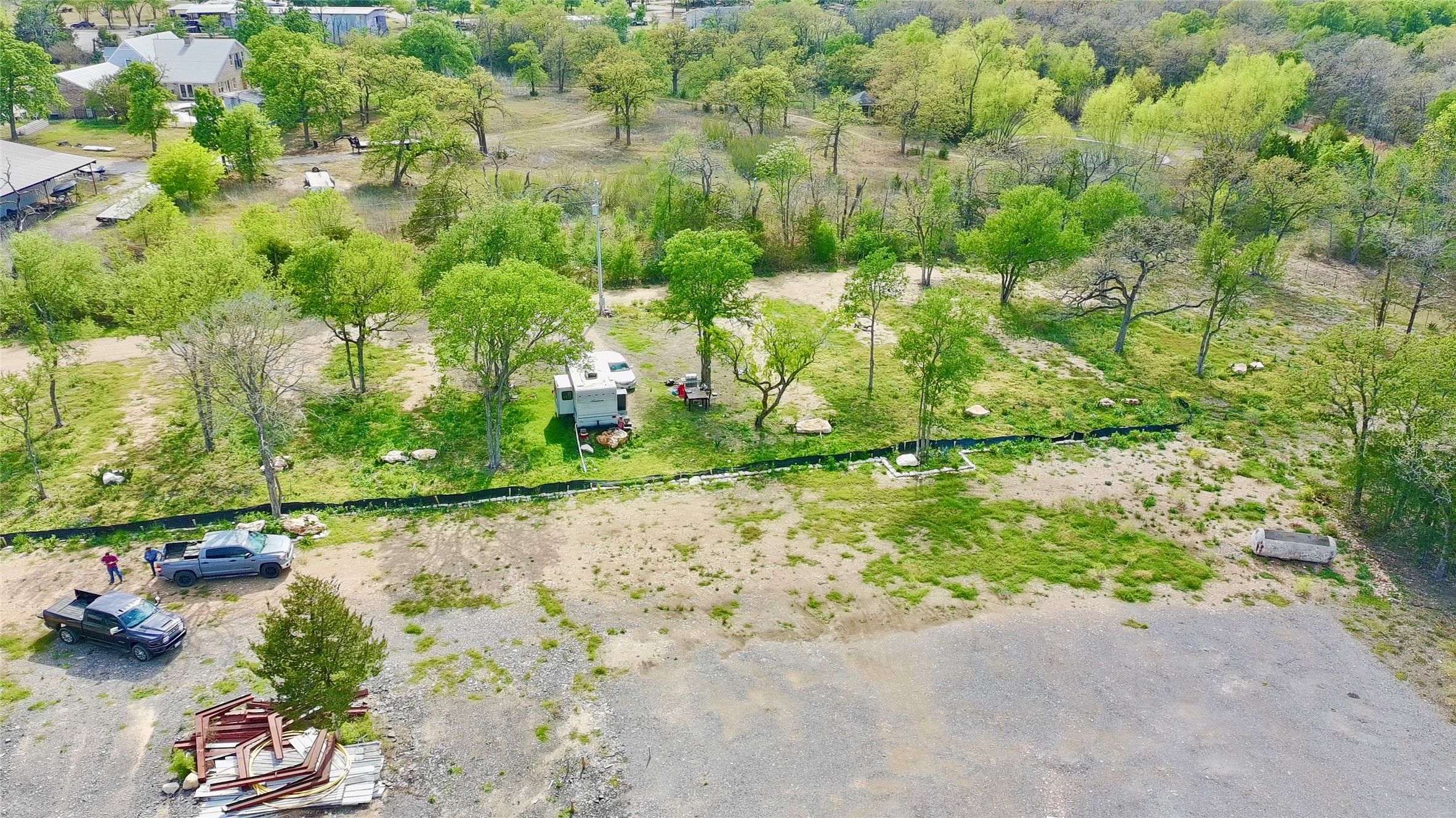 9024 Lockwood Springs Road Manor, TX 78653 - Photo 7 of 25 a view of a lake with a tree