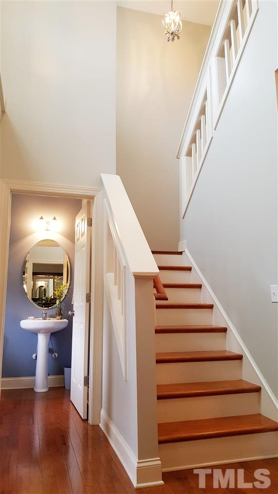 138 Tramway Circle Angier, NC 27501 - Photo 14 of 26 a view of entryway and hall with wooden floor