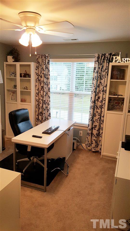 138 Tramway Circle Angier, NC 27501 - Photo 15 of 26 a bed room with a bed and a window