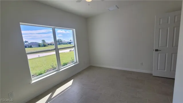 a view of an empty room with window