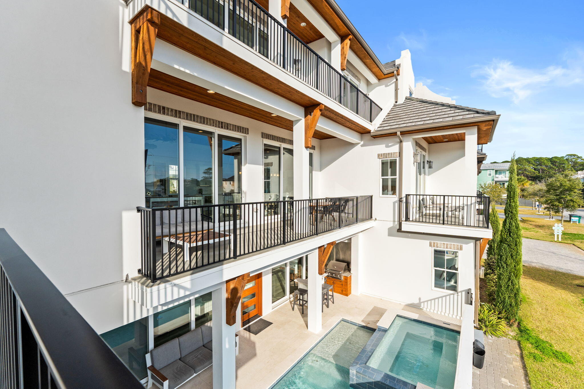 17 Penny Lane Santa Rosa Beach, FL 32459 - Photo 4 of 91 a view of a balcony with wooden floor and fence