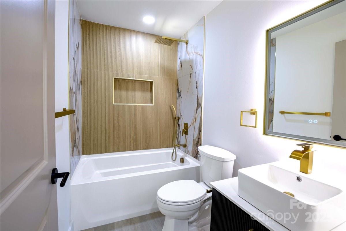 2918 Lon Street Shelby, NC 28152 - Photo 15 of 17 a bathroom with a sink toilet and shower