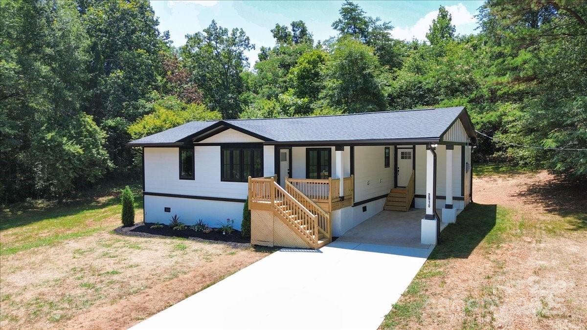 2918 Lon Street Shelby, NC 28152 - Photo 2 of 17 a front view of a house with garden