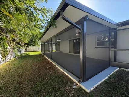 a view of backyard of the house