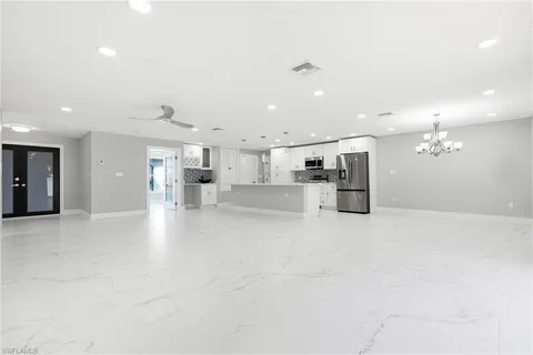 a view of kitchen with a sink