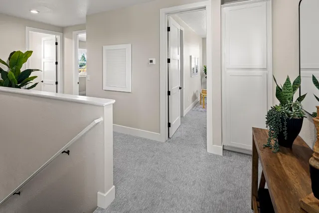 a view of hallway with livingroom and hallway