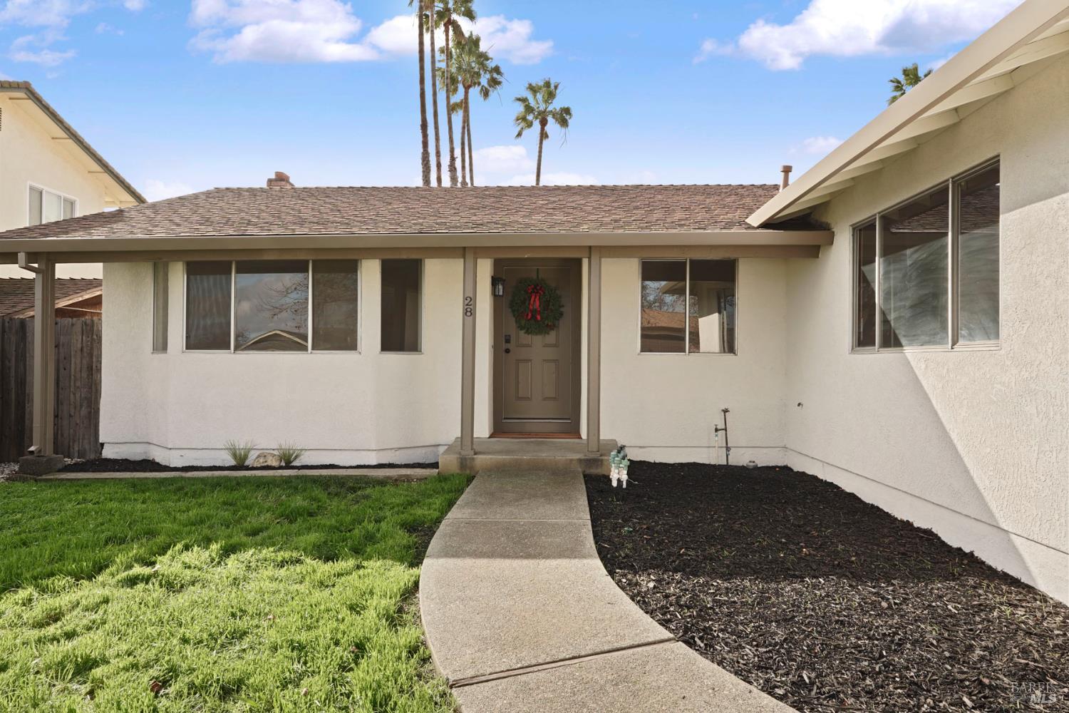 28 Amador Circle Rio Vista, CA 94571 - Photo 2 of 39 a front view of a house with a yard
