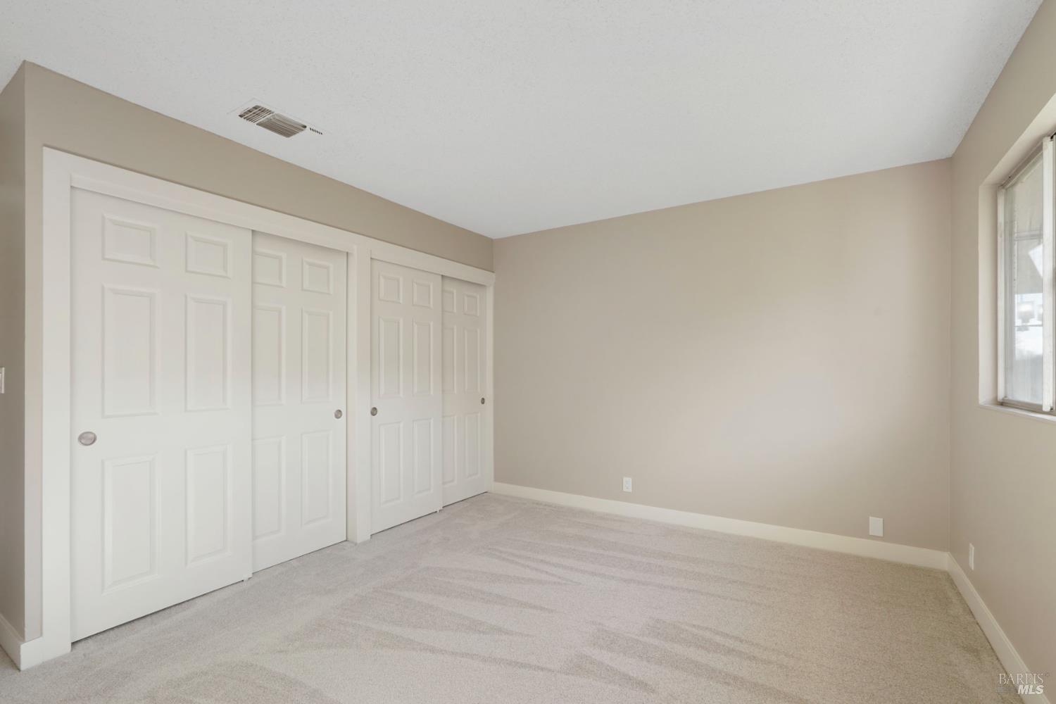 28 Amador Circle Rio Vista, CA 94571 - Photo 7 of 39 a view of an empty room and window