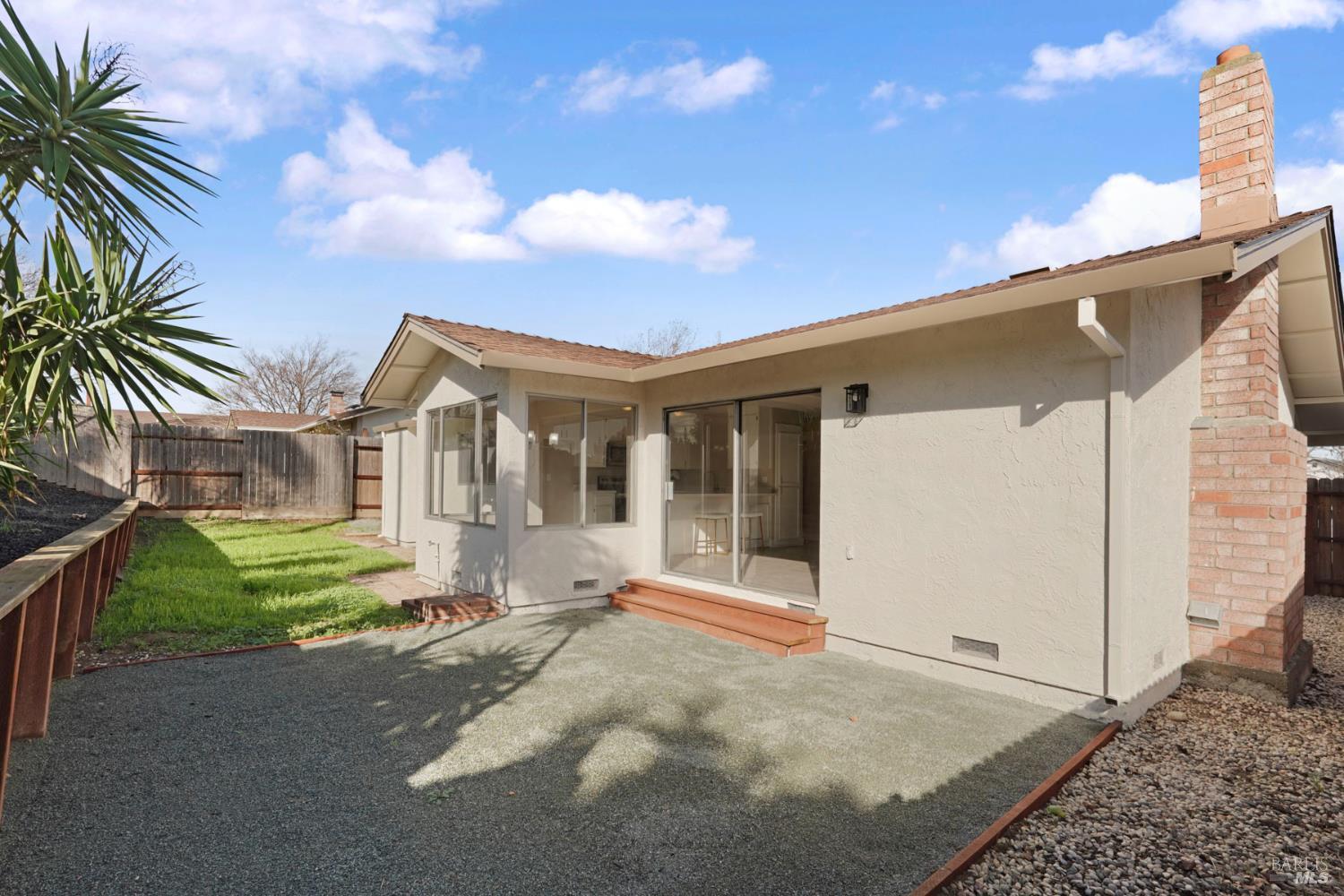 28 Amador Circle Rio Vista, CA 94571 - Photo 9 of 39 a view of a house with a yard and potted plants