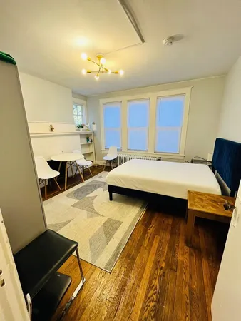 a room with a bed and a table