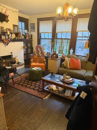 a room with furniture and gym equipment