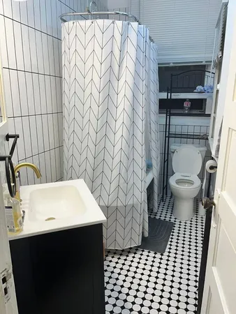 a bathroom with a sink and a toilet