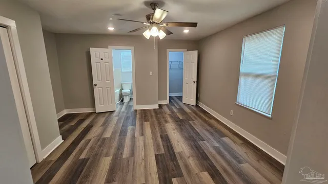 a view of a livingroom with wooden floor