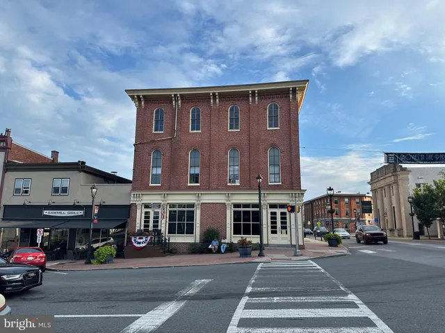 a view of a building with a street