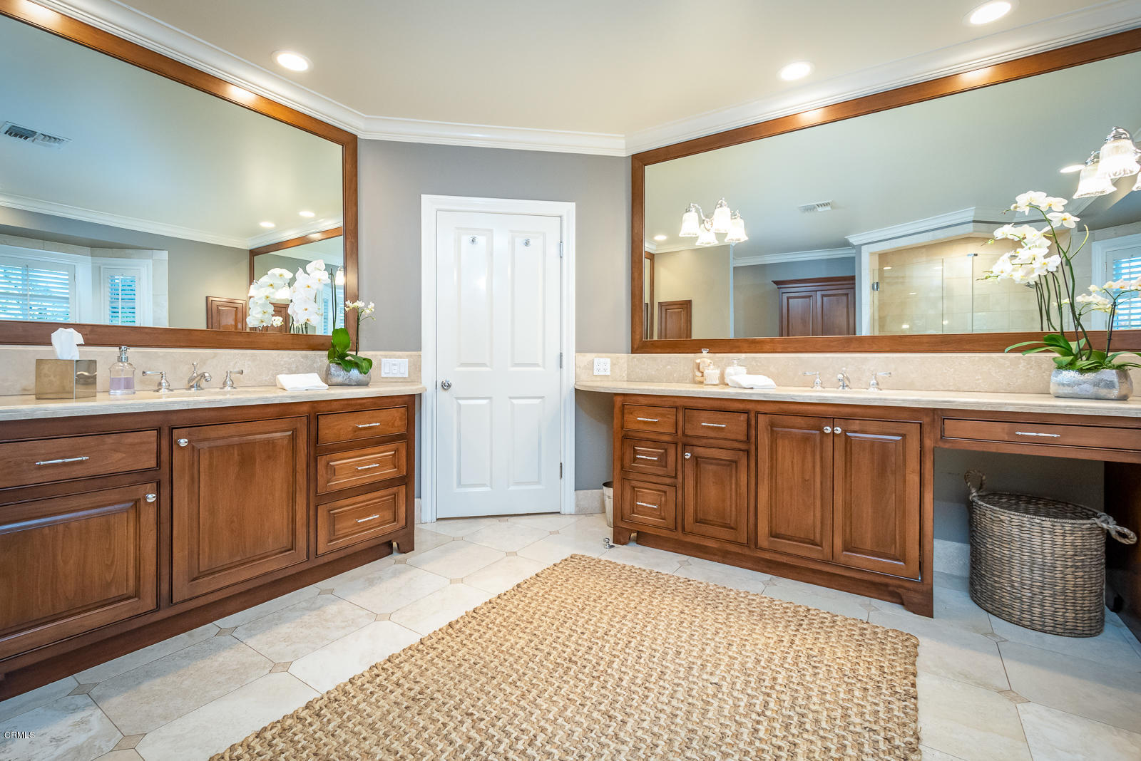 551 Georgian Road La Canada Flintridge, CA 91011 - Photo 30 of 56 a spacious bathroom with a granite countertop sink and a mirror