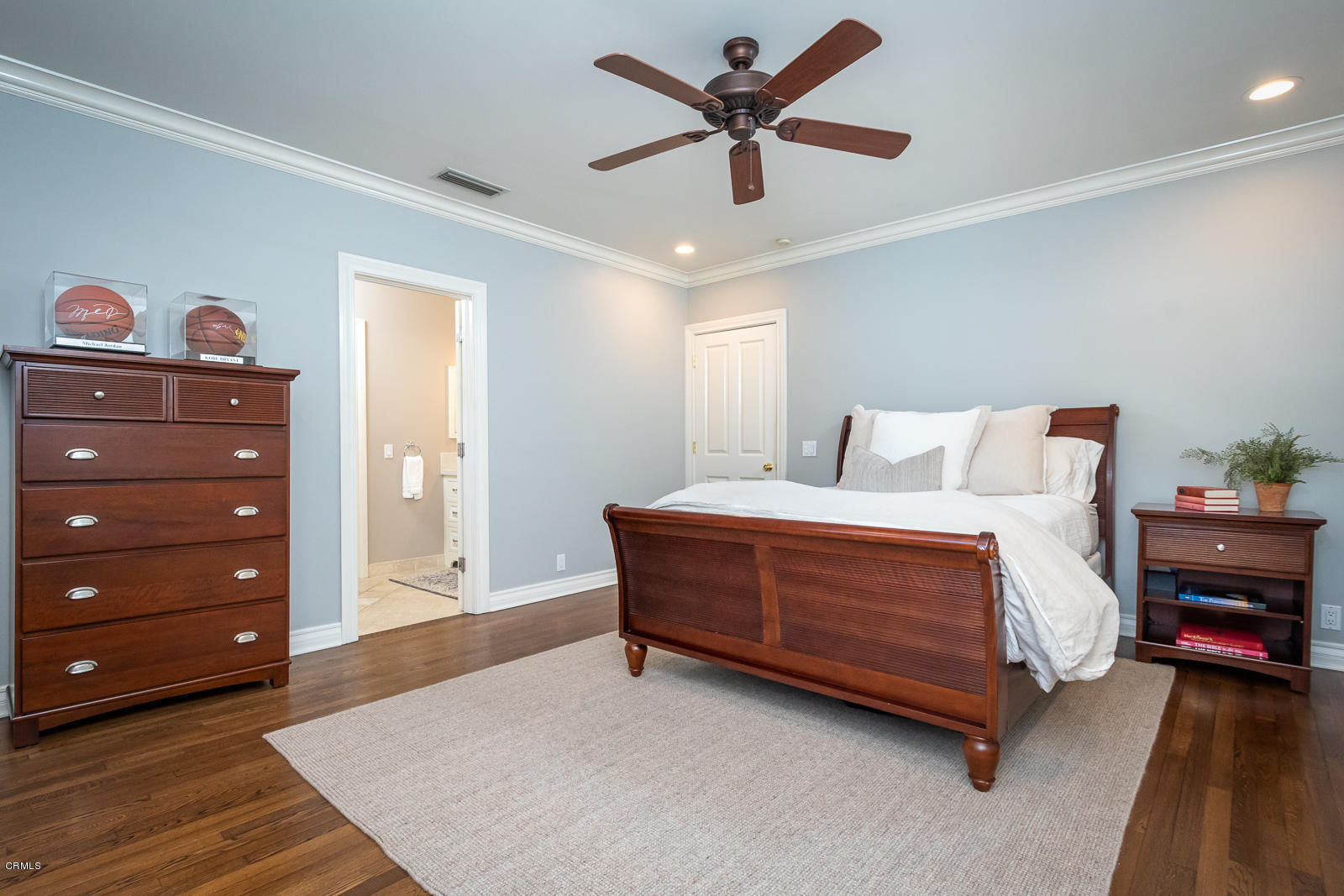 551 Georgian Road La Canada Flintridge, CA 91011 - Photo 36 of 56 a spacious bedroom with a bed and a ceiling fan