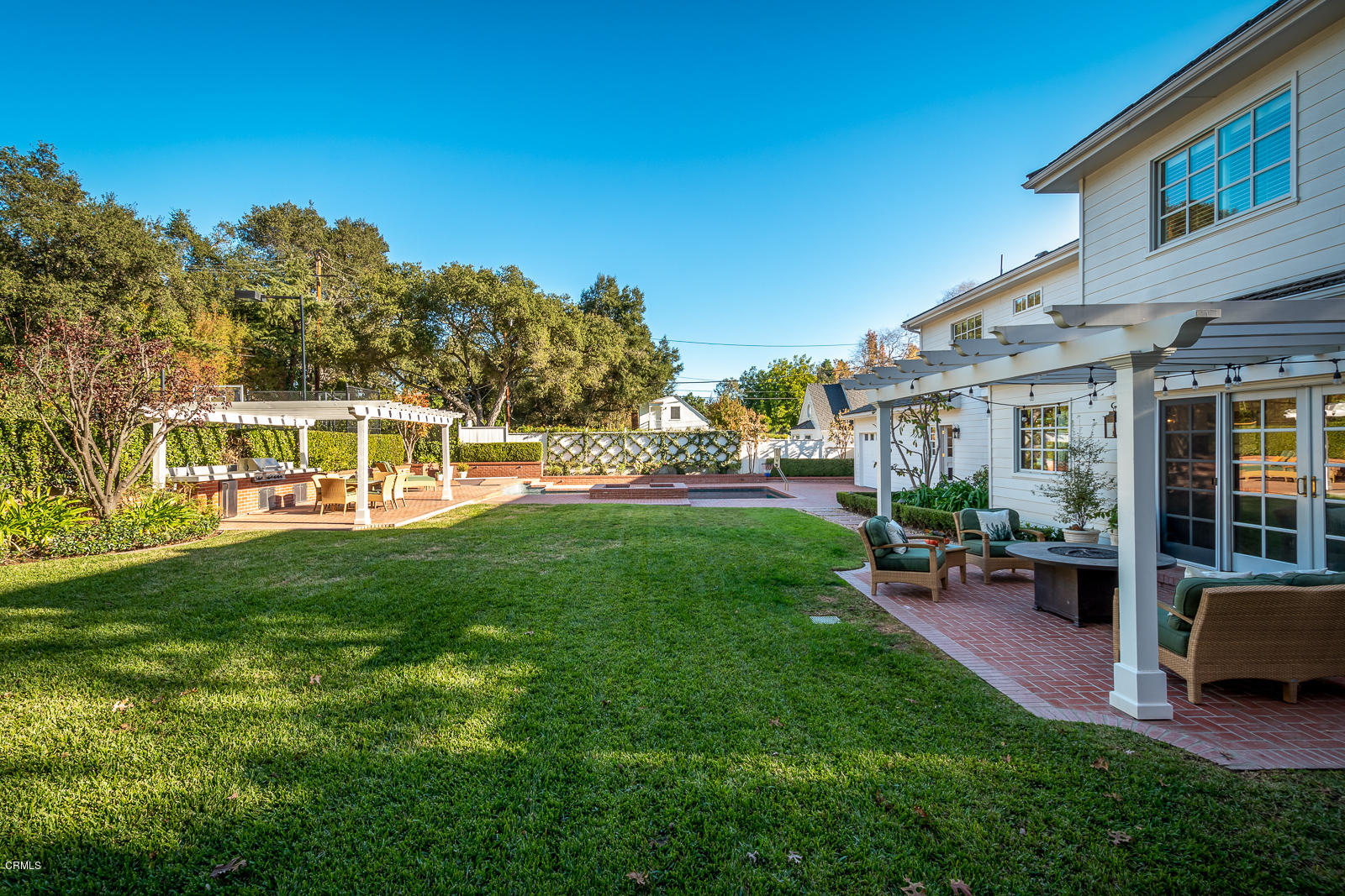551 Georgian Road La Canada Flintridge, CA 91011 - Photo 46 of 56 a view of a house with a yard porch and sitting area