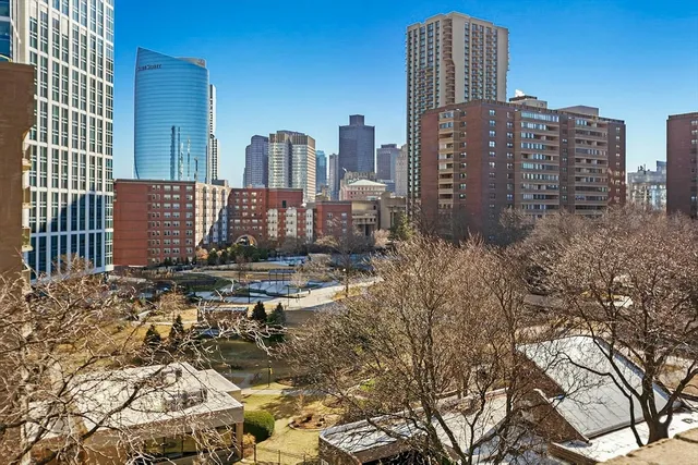 a view of a city with tall buildings