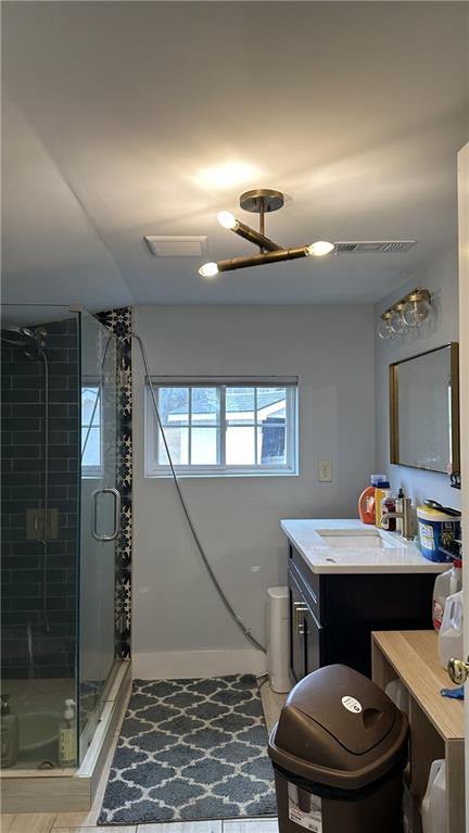 7040 Alan Thomas Road Dawsonville, GA 30534 - Photo 7 of 7 a bathroom with a sink a toilet and shower
