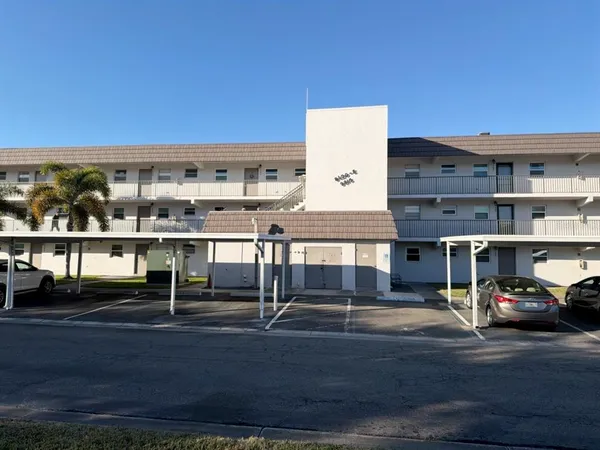 a front view of a building with street