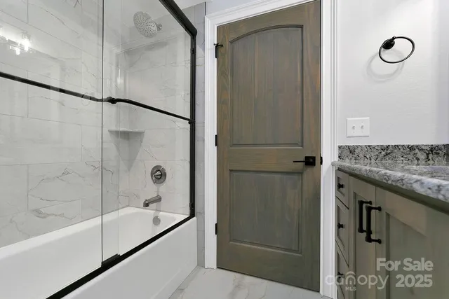 a view of a house with backyard and porch