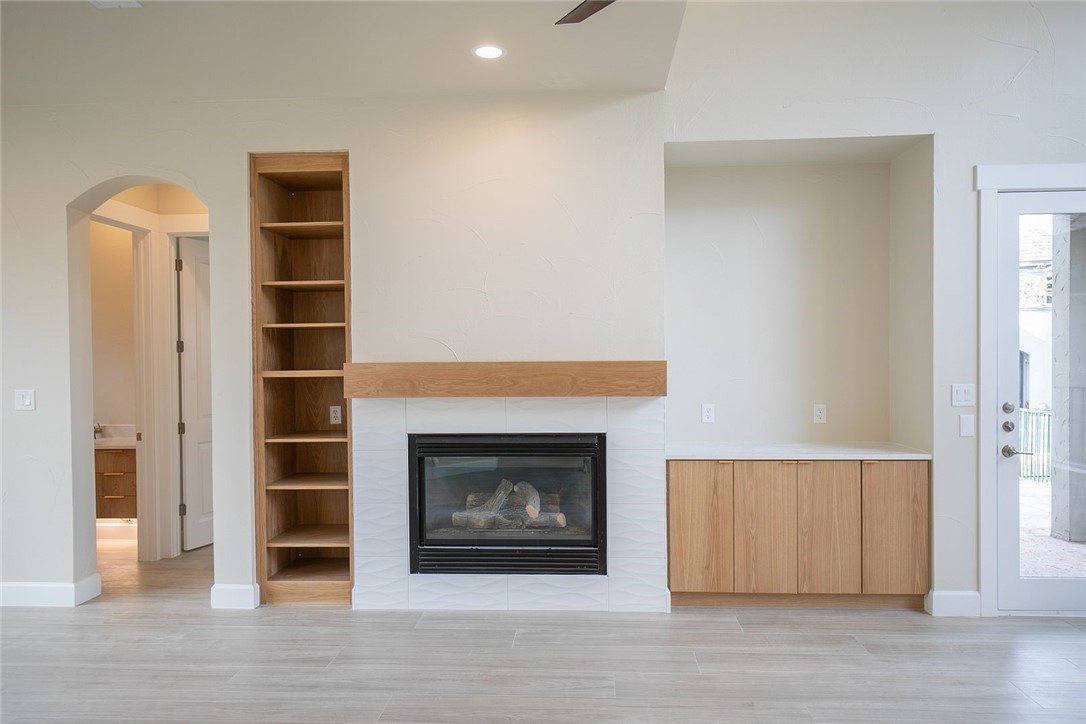 2800 Waymaker Way, Unit 29 Austin, TX 78746 - Photo 8 of 25 a view of a livingroom with a fireplace