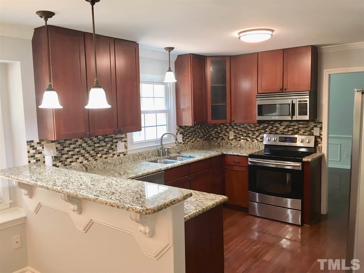 7109 Grist Mill Road Raleigh, NC 27615 - Photo 6 of 25