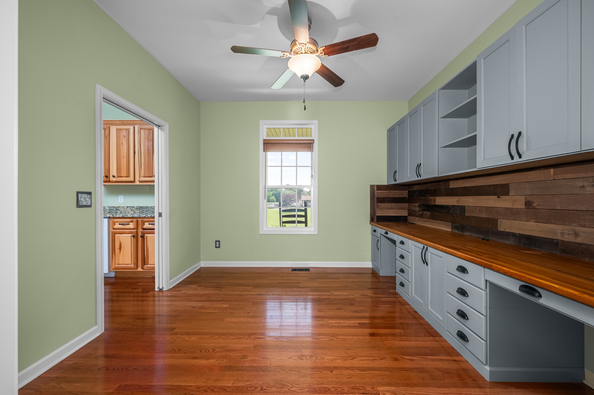 7540 Joe Rowlin Road Christiana, TN 37037 - Photo 13 of 42 a view of an empty room with window and wooden floor