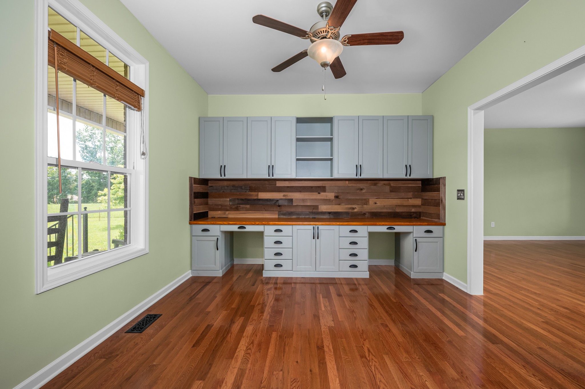 7540 Joe Rowlin Road Christiana, TN 37037 - Photo 14 of 42 a room with a wooden floor and window