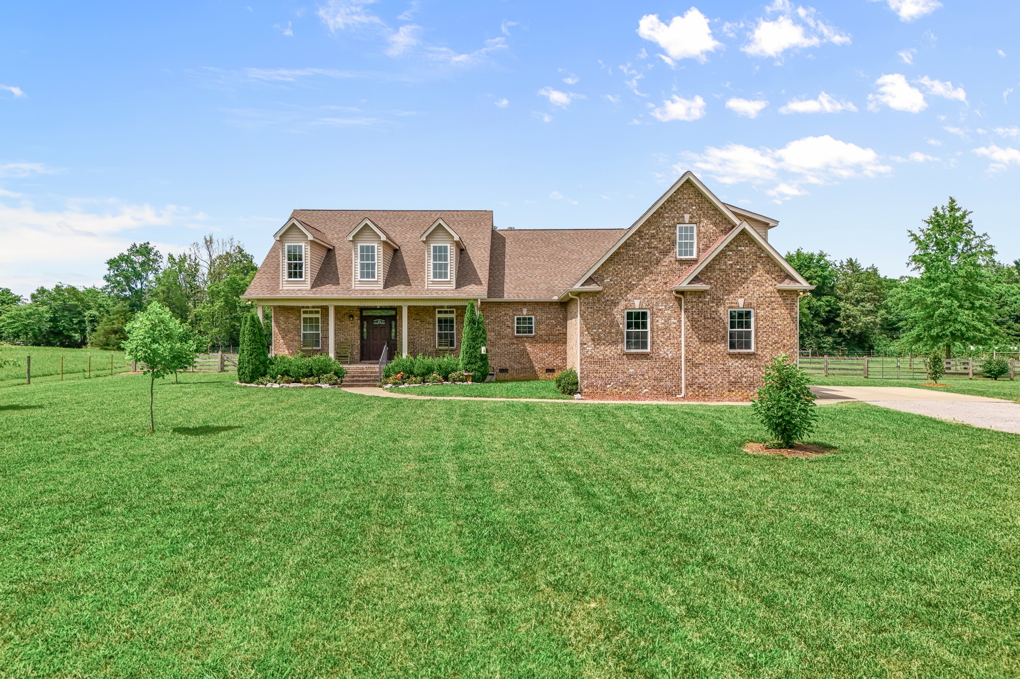 7540 Joe Rowlin Road Christiana, TN 37037 - Photo 2 of 42 a front view of a house with a yard