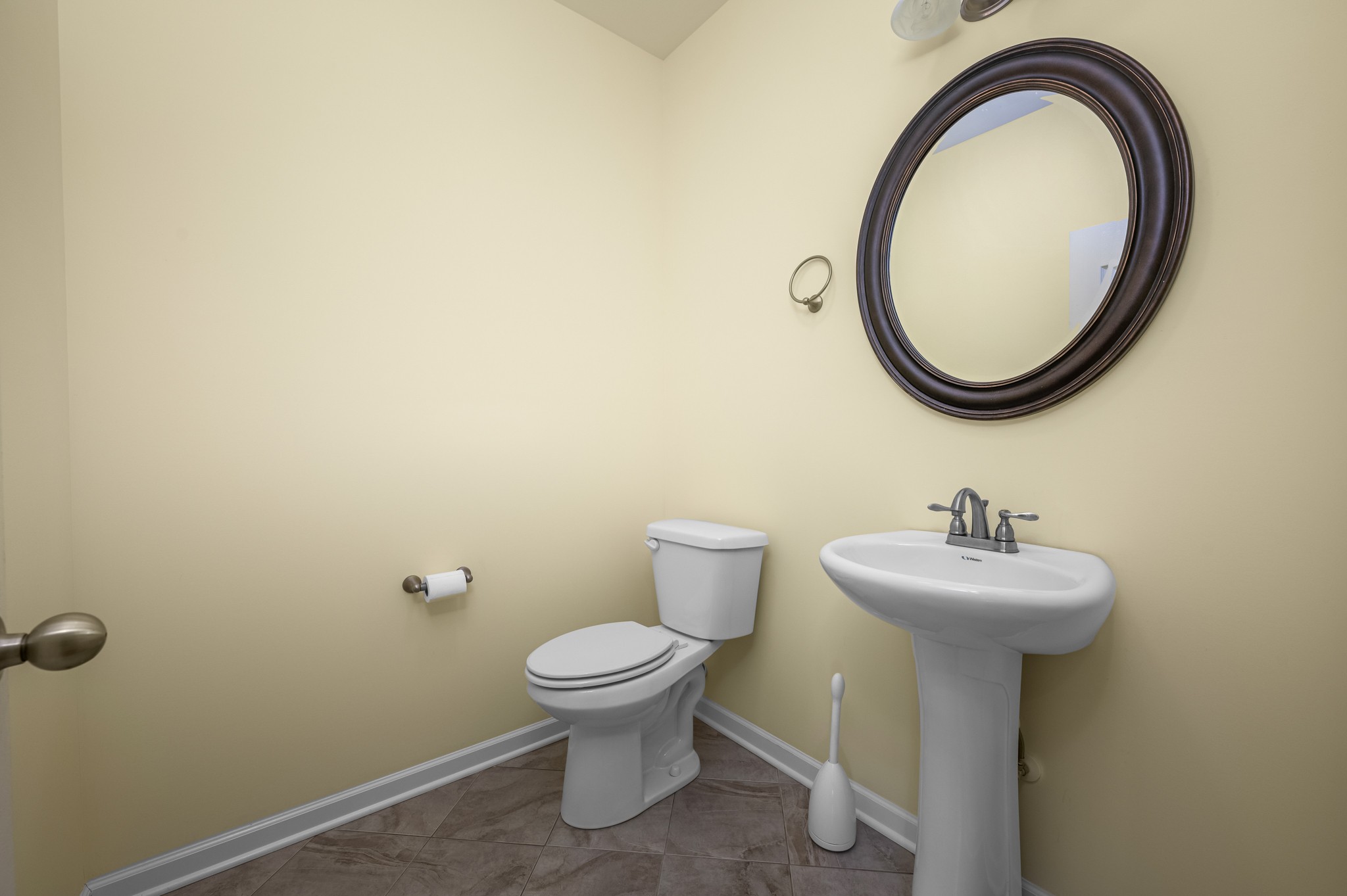 7540 Joe Rowlin Road Christiana, TN 37037 - Photo 24 of 42 a bathroom with a sink mirror and toilet