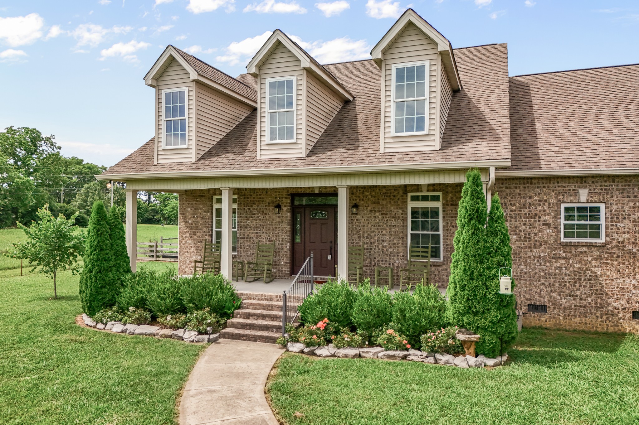 7540 Joe Rowlin Road Christiana, TN 37037 - Photo 3 of 42 front view of a house with a yard