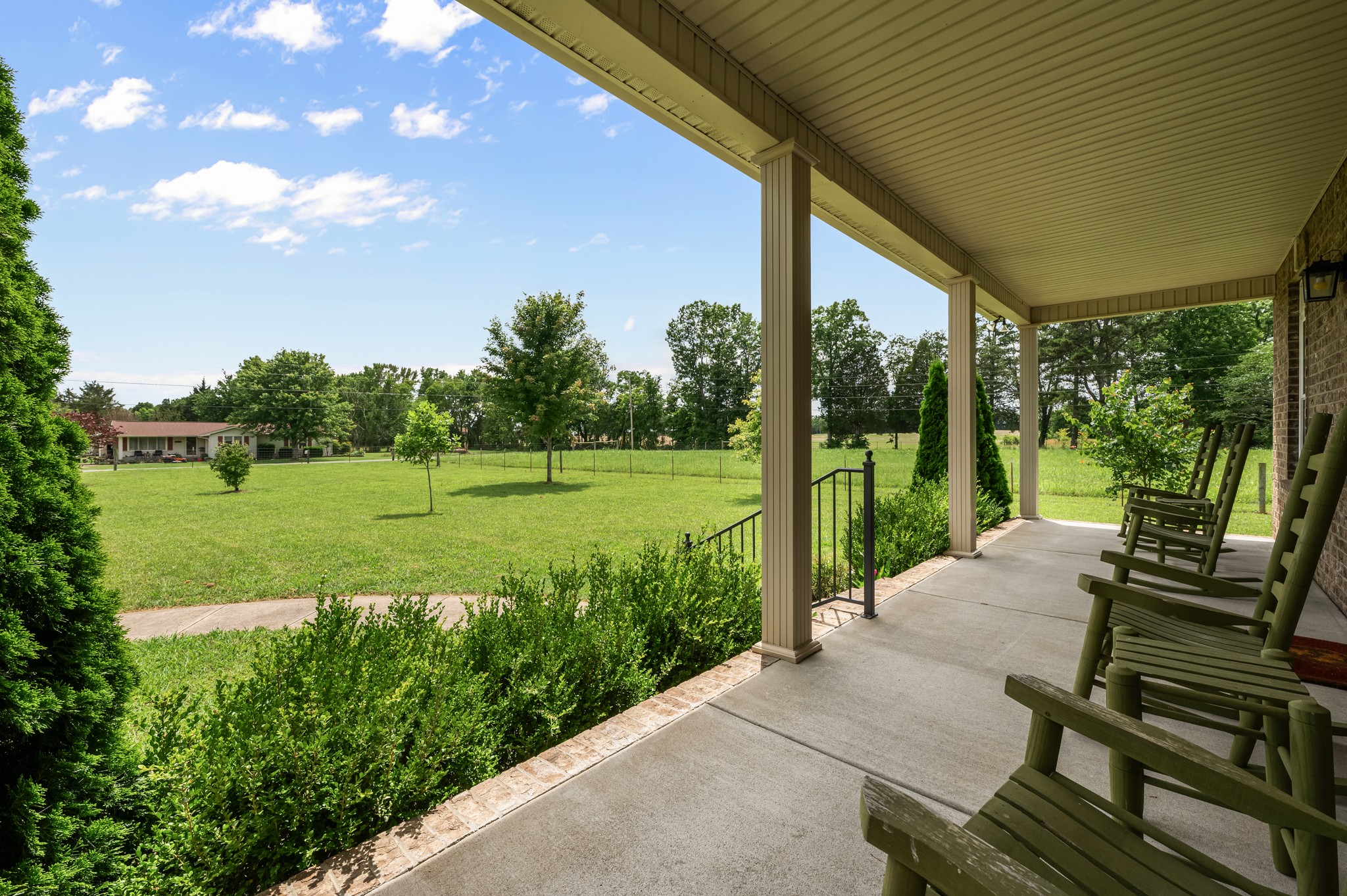 7540 Joe Rowlin Road Christiana, TN 37037 - Photo 33 of 42 a view of a garden with plants and large trees