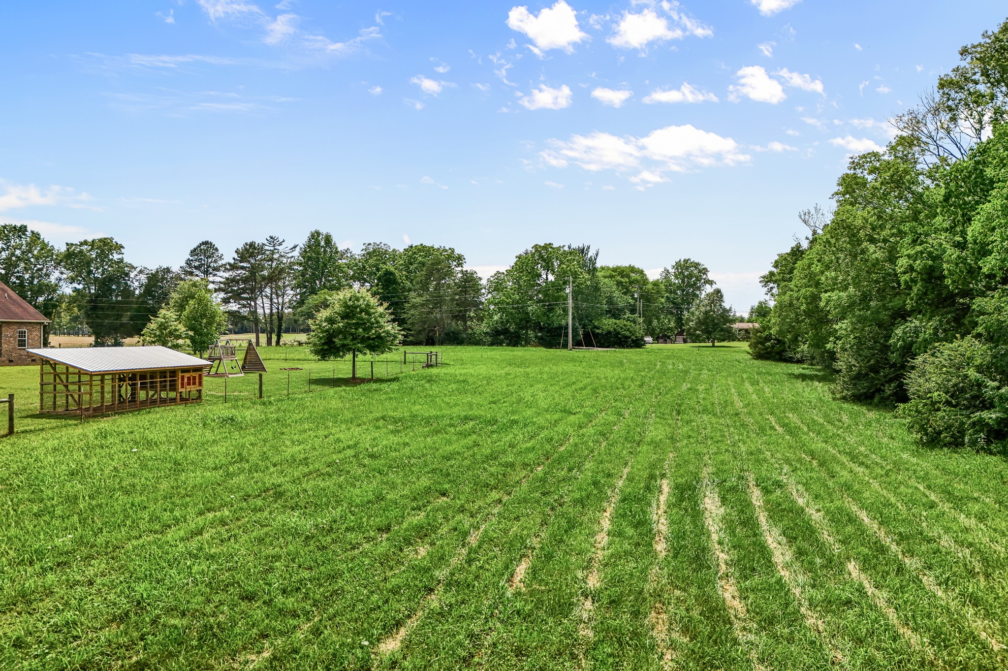 7540 Joe Rowlin Road Christiana, TN 37037 - Photo 38 of 42 a view of a golf course with a lake view