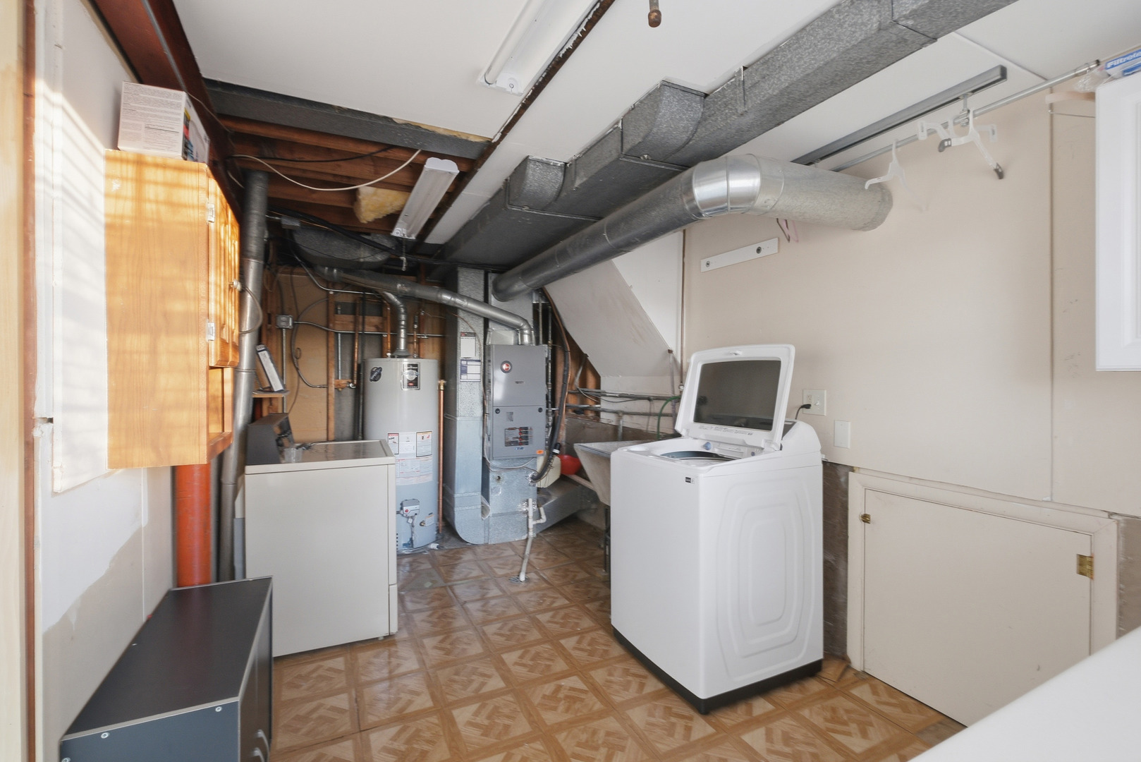 3208 Wren Lane Rolling Meadows, IL 60008 - Photo 19 of 30 a utility room with dryer and washer