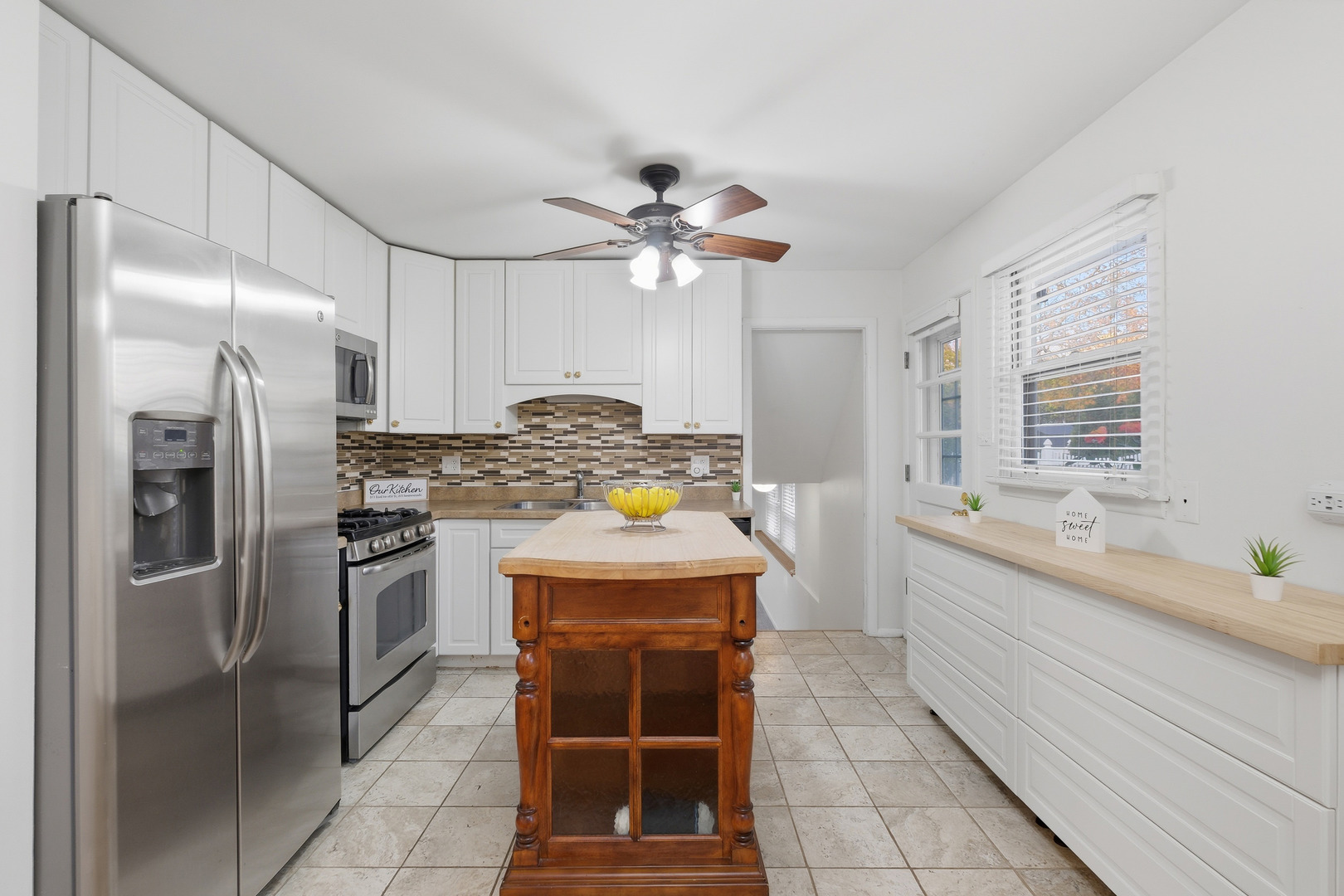 3208 Wren Lane Rolling Meadows, IL 60008 - Photo 6 of 30 a kitchen with stainless steel appliances a refrigerator sink and stove