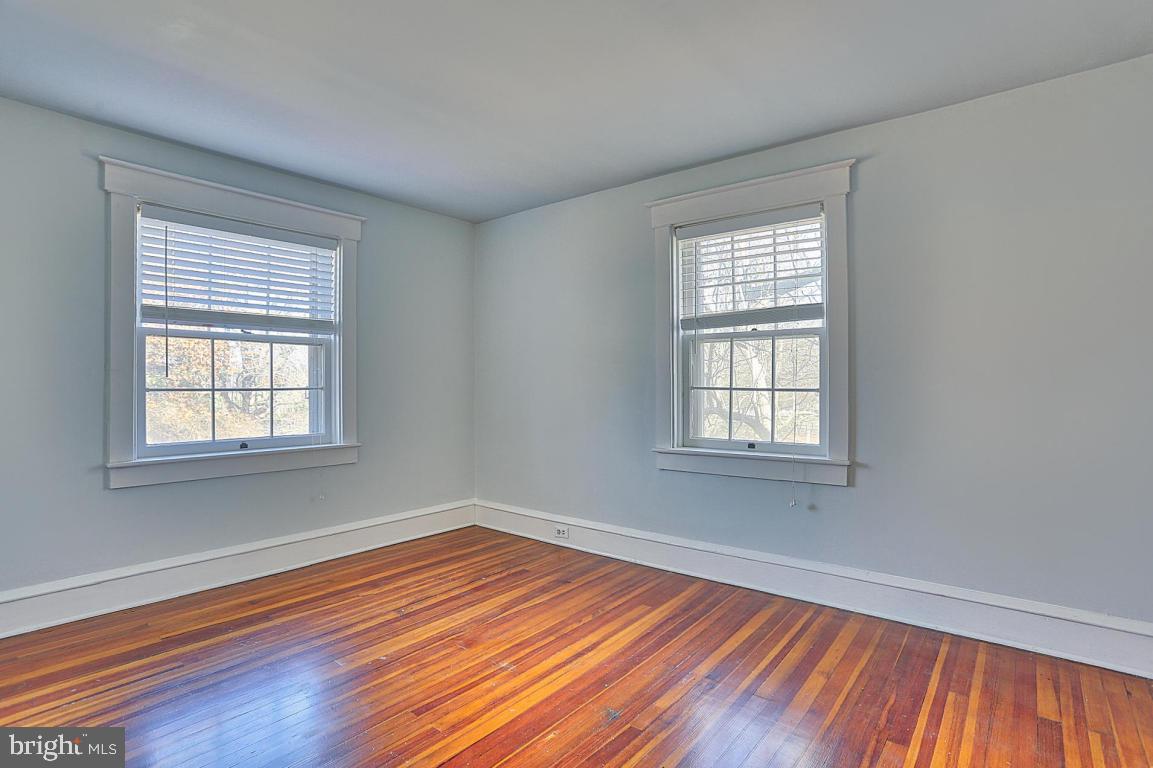 181 Windover Turn Lancaster, PA 17601 - Photo 17 of 58 a view of empty room with wooden floor and fan