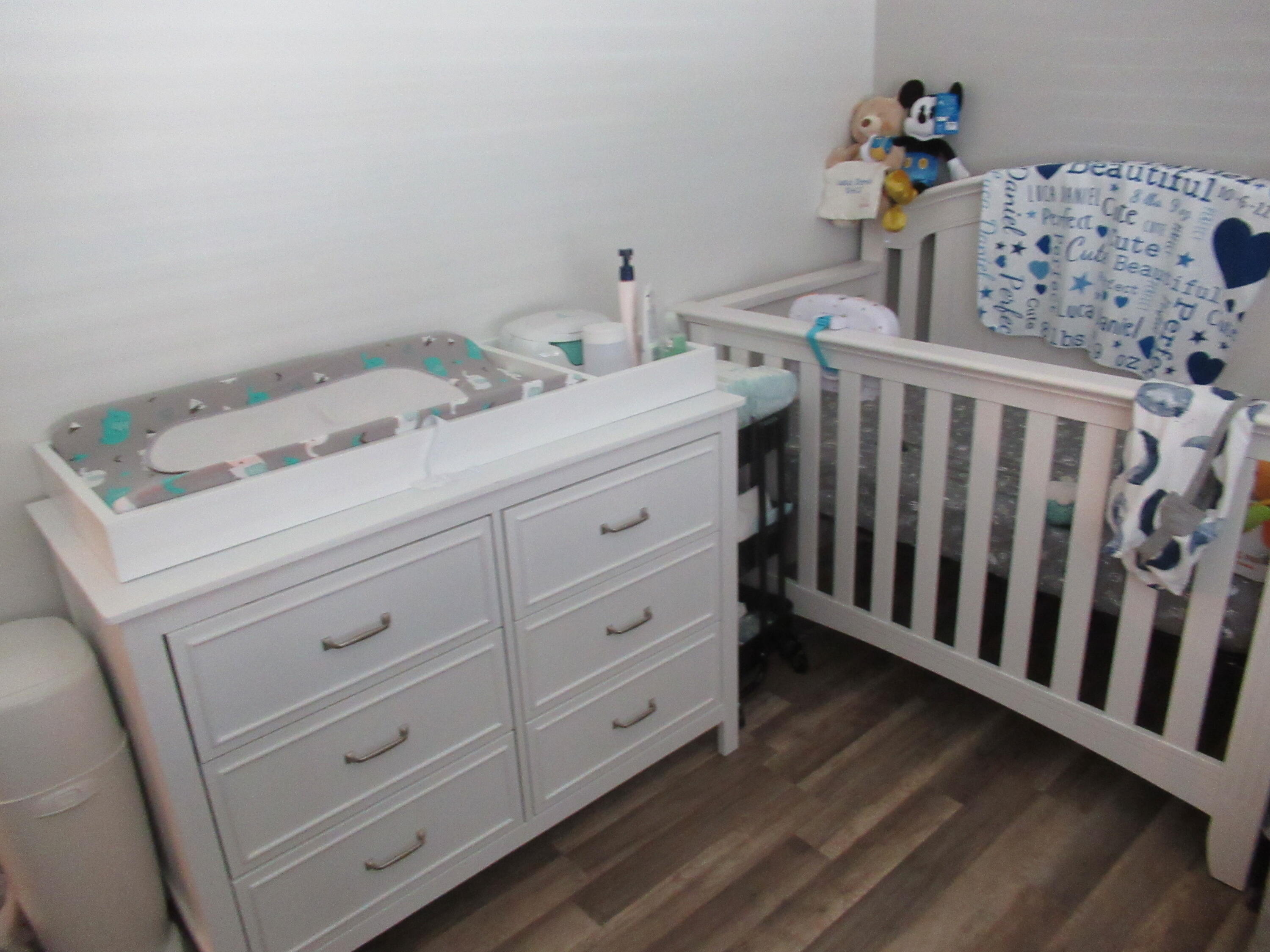 22016 Palms Way, Unit 204 Boca Raton, FL 33433 - Photo 11 of 23 a bedroom with a bed and a window
