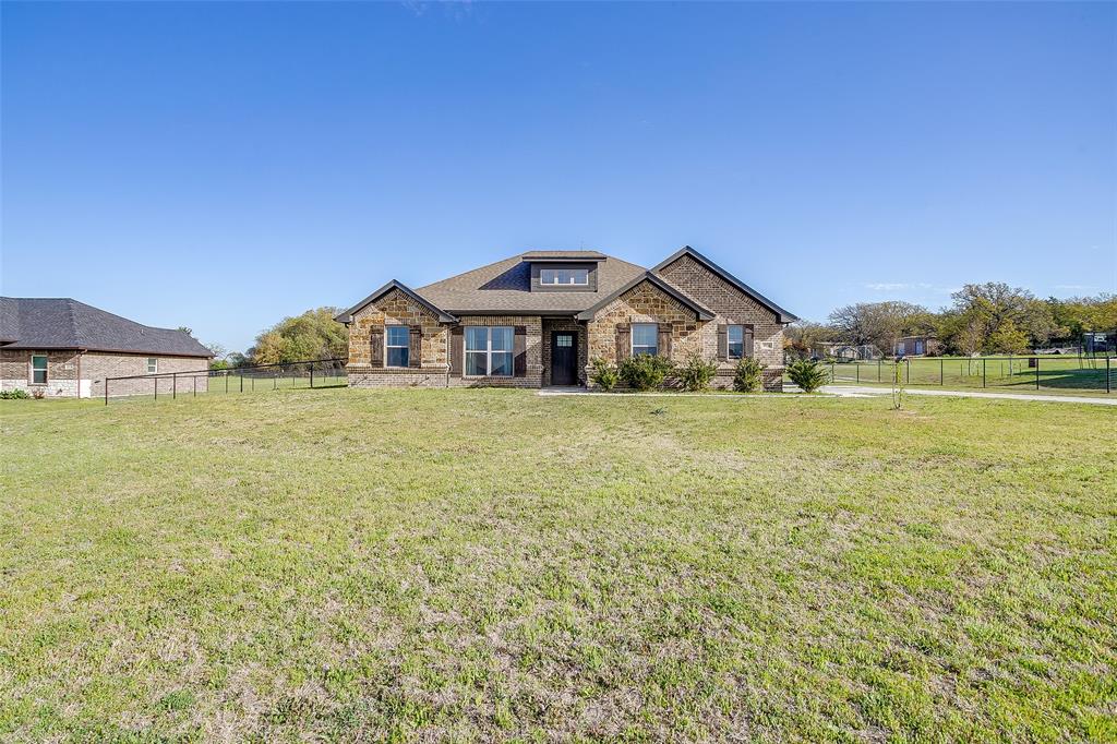 1028 Hope Court Boyd, TX 76023 - Photo 4 of 40 a view of a house with a big yard