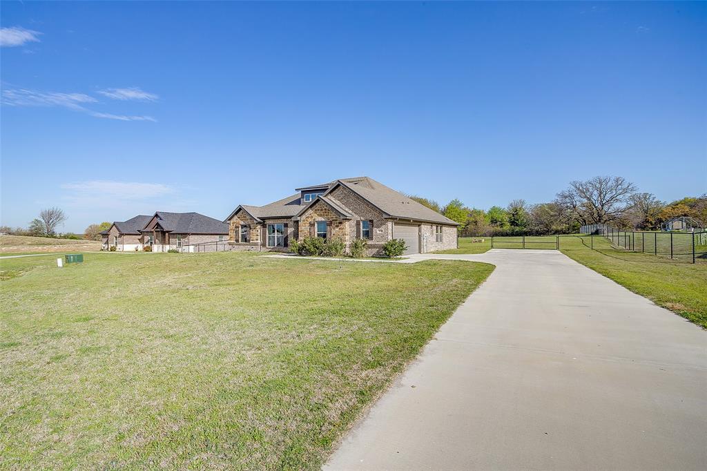 1028 Hope Court Boyd, TX 76023 - Photo 6 of 40 a view of house with outdoor space and seating area