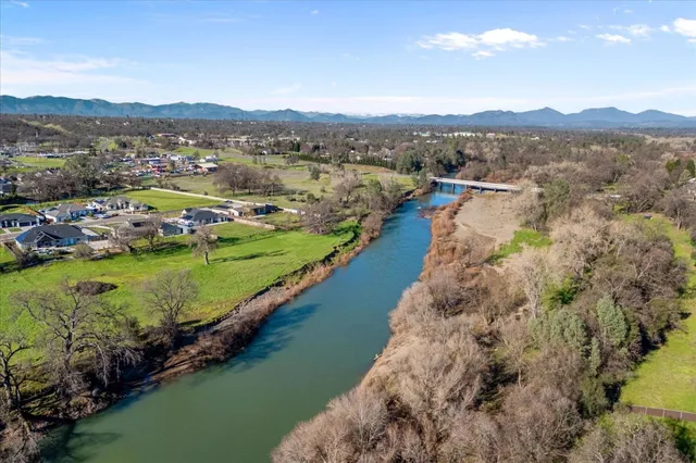 a view of a city with mountains in the background