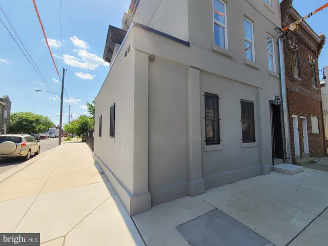 a potted plant sitting in front of a building