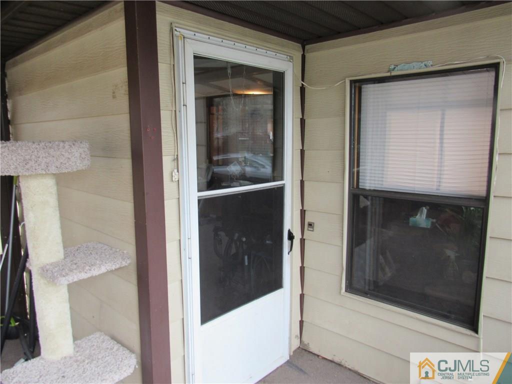 37 Whitman Road, Unit 37 North Brunswick, NJ 08902 - Photo 3 of 20 a bathroom with a glass shower door
