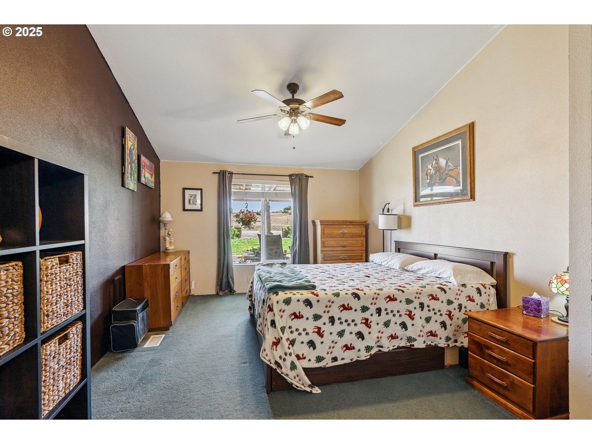 115 Sunset Drive Goldendale, WA 98620 - Photo 11 of 48 a bedroom with a bed dresser and a window