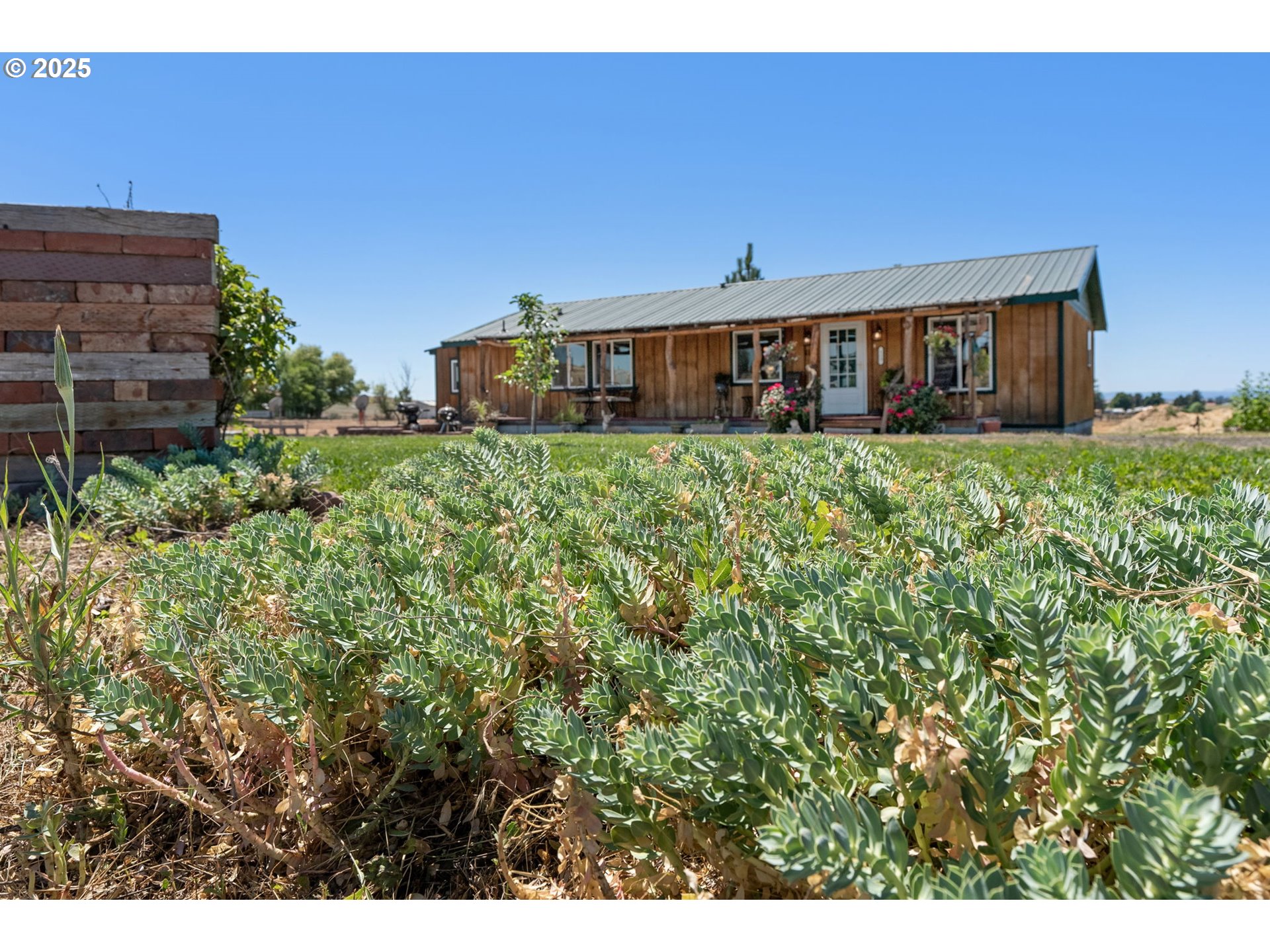 115 Sunset Drive Goldendale, WA 98620 - Photo 28 of 48 a view of a house with a yard