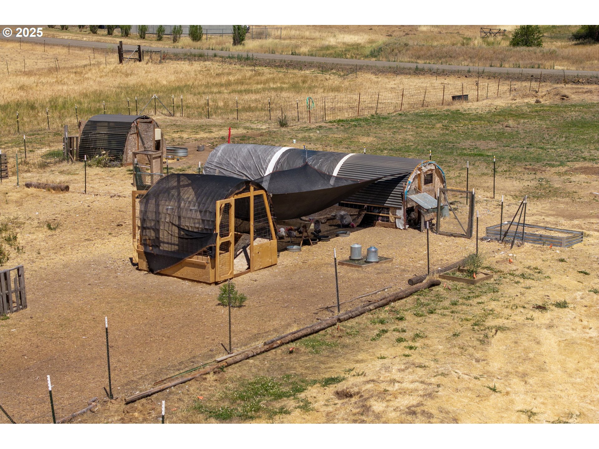 115 Sunset Drive Goldendale, WA 98620 - Photo 39 of 48 a view of a lake with a table and chairs