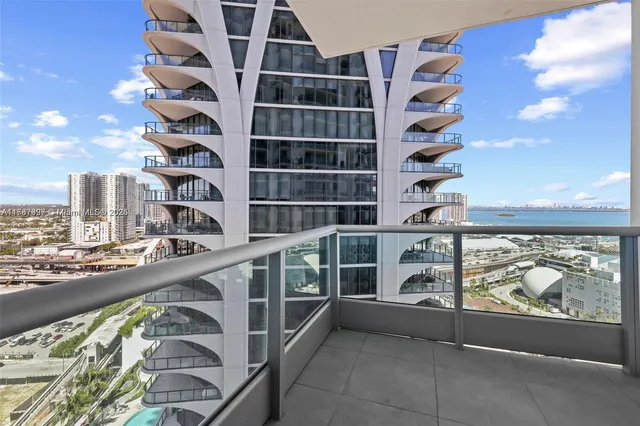 a view of a city from a balcony