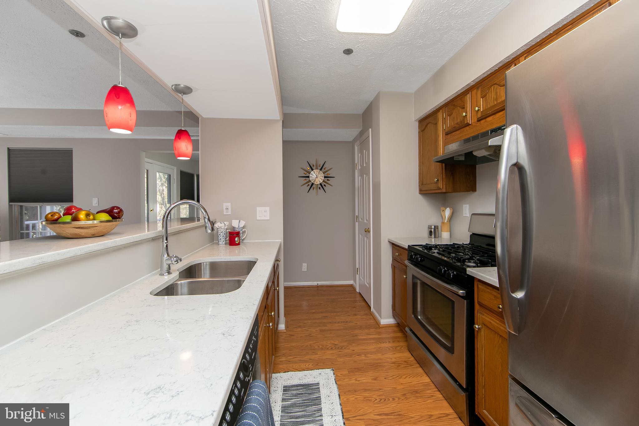 8 Inverness Circle Marlton, NJ 08053 - Photo 12 of 39 a kitchen that has a lot of cabinets a sink and appliances