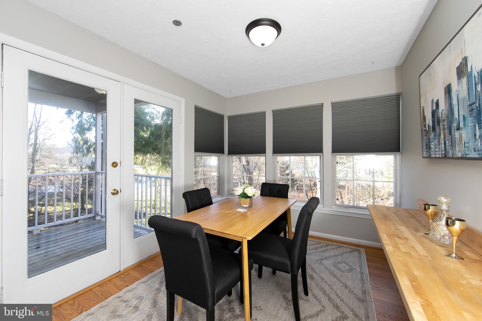 8 Inverness Circle Marlton, NJ 08053 - Photo 15 of 39 a view of a dining room with furniture window and outside view