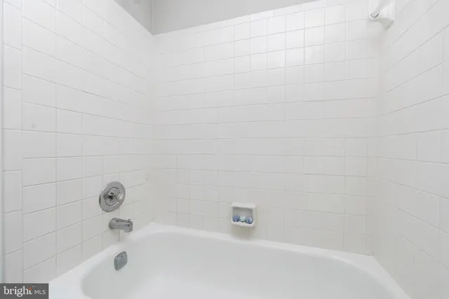 a bathroom with bathtub